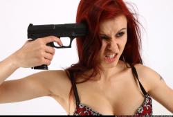 Nina Sitting Pose With Pistol Pose 